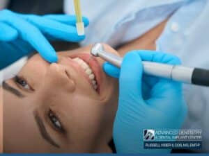 Patient receiving Dental Implants treatment during a professional dental procedure