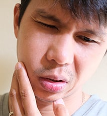 You Might Need Dental Bridges If You Feel Jaw Pain or Suffer TMJ Disorders