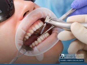 Dentist performing a dental implant procedure at Dr Kiser Center