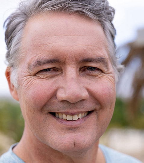 close-up-portrait-of-smiling-caucasian-senior-man You Might Need Teeth Whitening If You Smoke Or Use Tobacco
